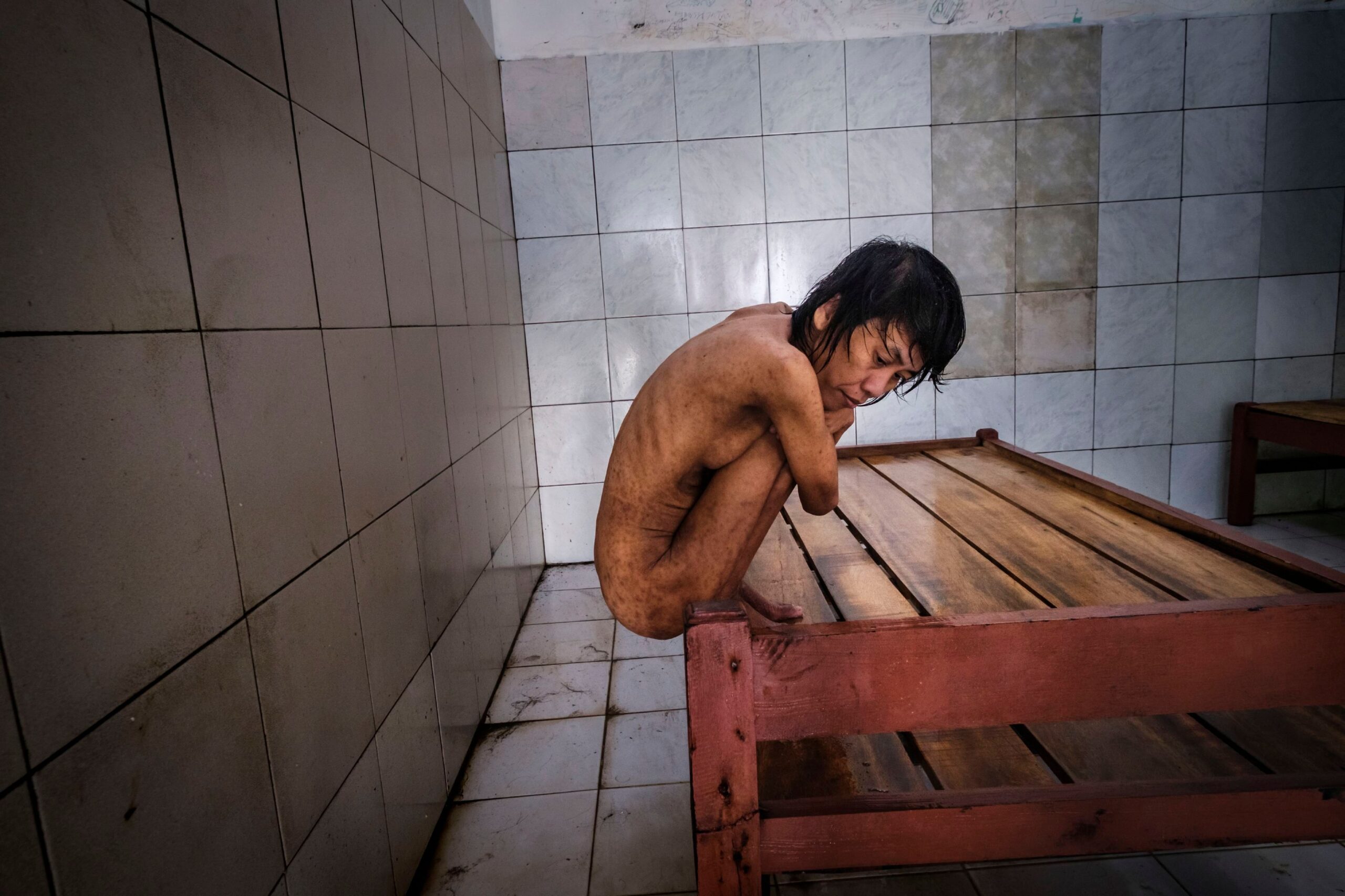 Frame 15 of 15 from Chains of Madness, a photo essay by Alain Schroeder