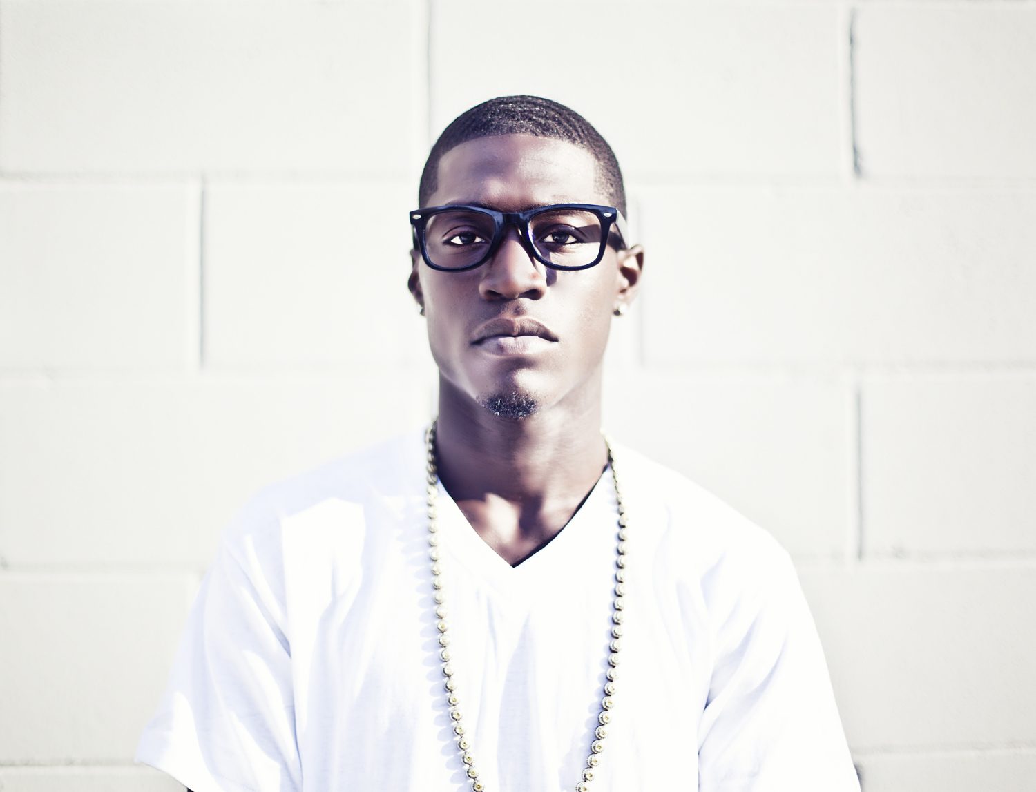Glasses, face. Portrait photograph by Ashley Kolodner, finalist in the Shoot The Frame Portrait photography award, July 2012