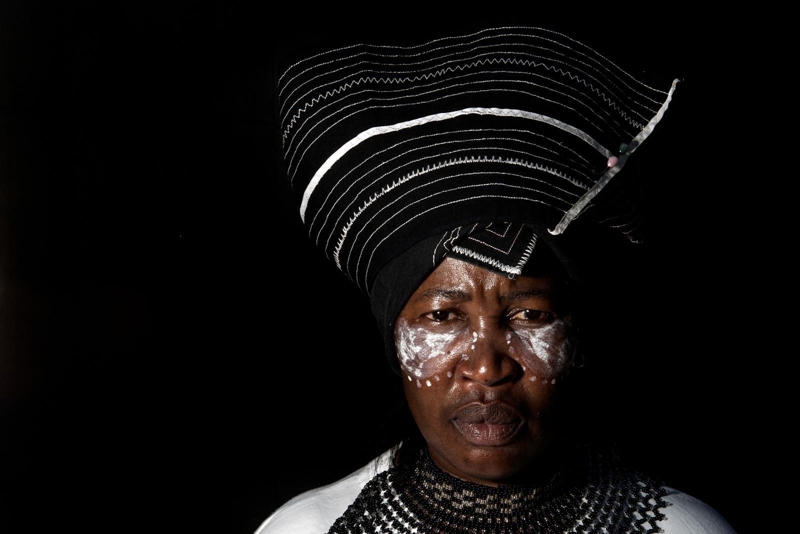 Woman, black, hat, painted. Portrait photograph by Frank Trimbos, finalist in the Shoot The Frame Portrait photography award, October 2012
