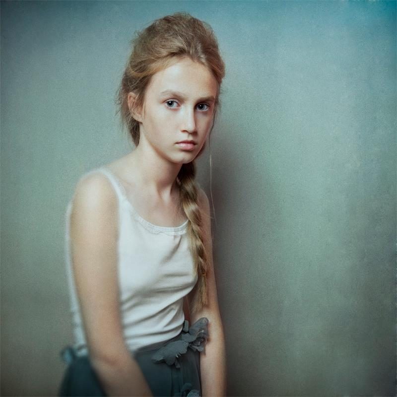 Woman, girl, braid. Portrait photograph by Olga Astratova, finalist in the Shoot The Frame Portrait photography award, December 2012