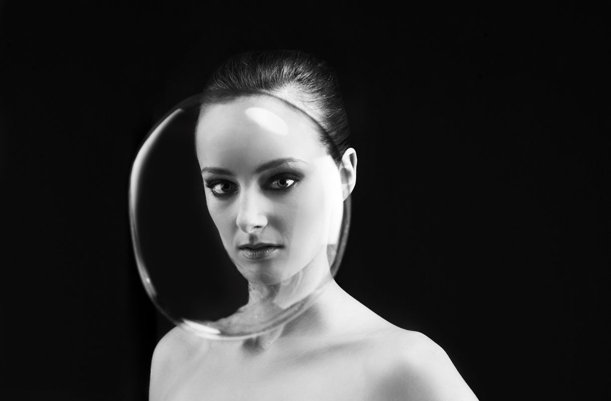 Woman, black, white, bubbles. Portrait photograph by Hemali Zaveri, finalist in the Shoot The Frame Portrait photography award, March 2013