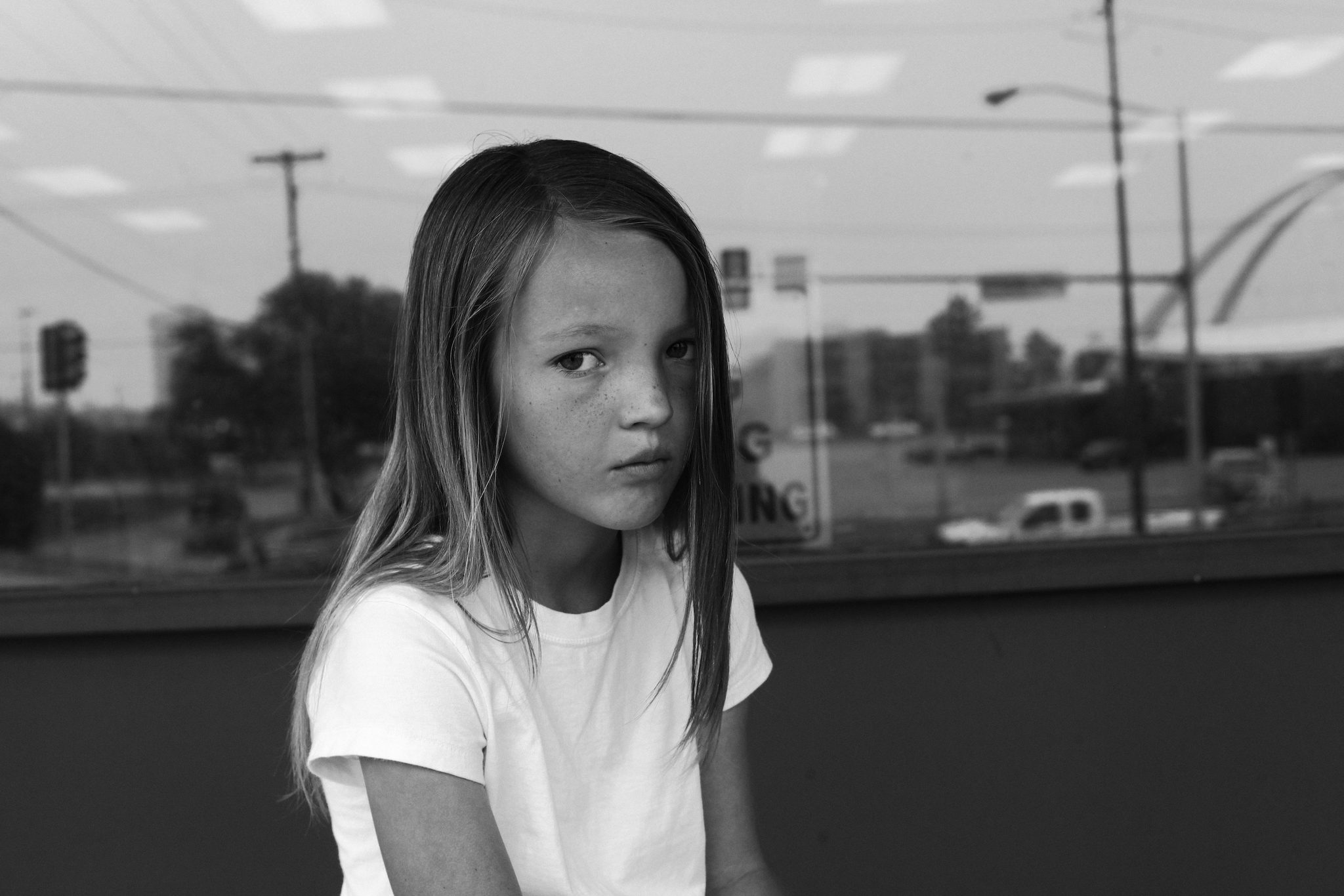 Girl, white, city. Portrait photograph by Jasper Briggs, finalist in the Shoot The Frame Portrait photography award, May 2013