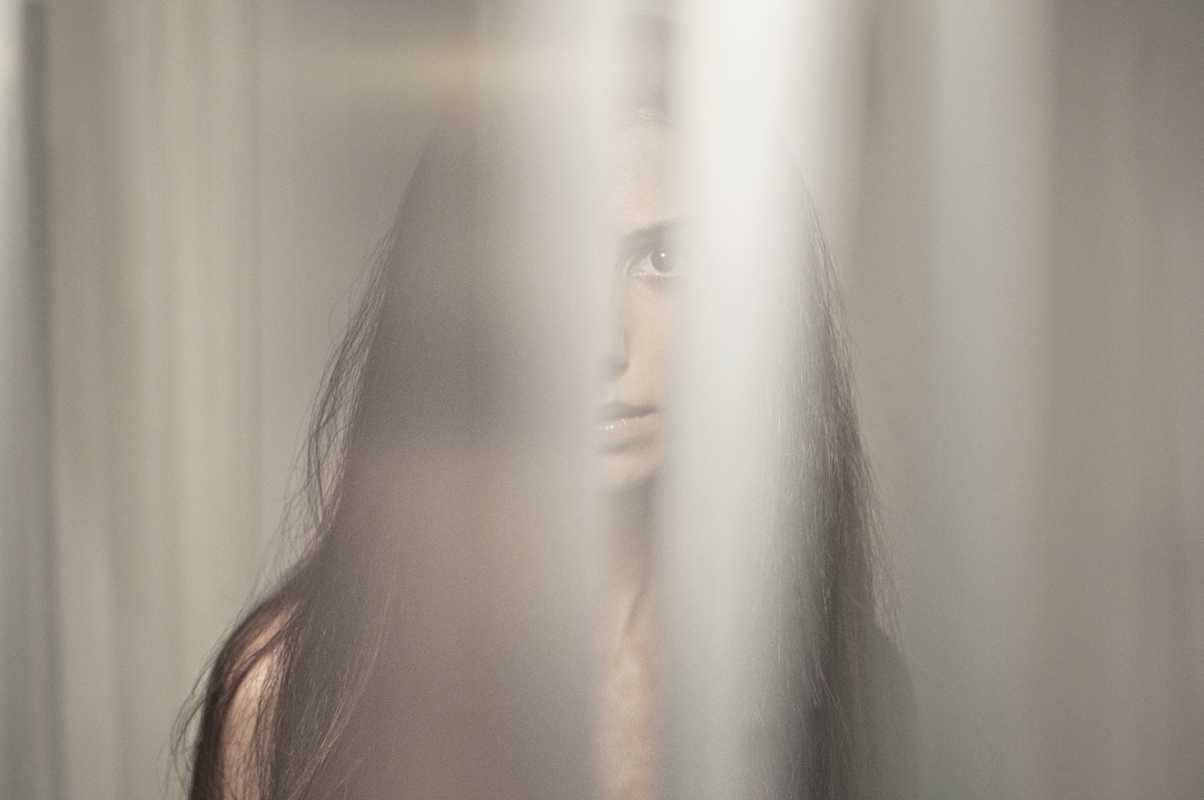 Woman, hair, lights. Portrait photograph by George Kamelakis, finalist in the Shoot The Frame Portrait photography award, September 2013