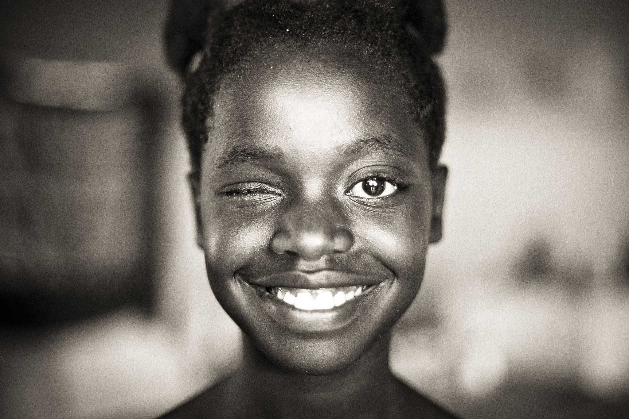 Girl, black, one eye. Portrait photograph by Adrian Kuipers, finalist in the Shoot The Frame Portrait photography award, January 2014