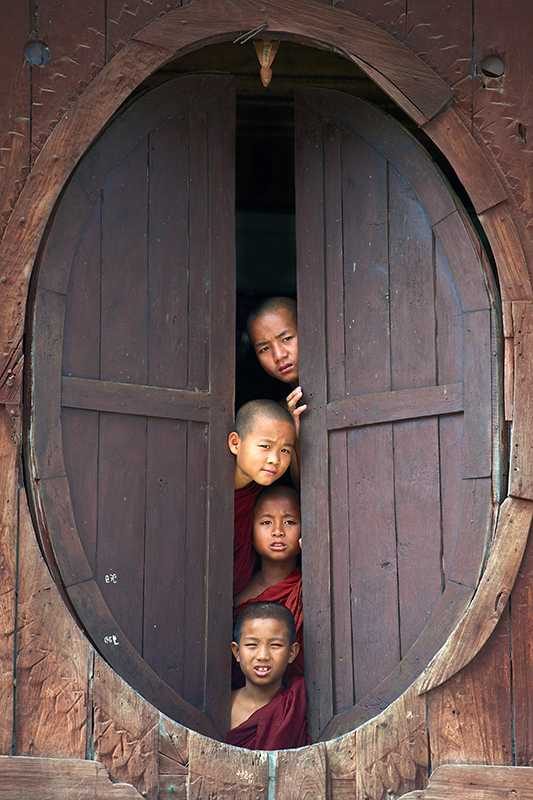 Chikdren, door, peeping. Portrait photograph by Seshukumar Sareday, finalist in the Shoot The Frame Portrait photography award, April 2014