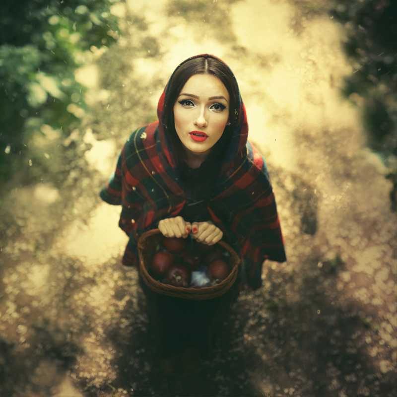 Wman, basket, hood. Portrait photograph by Cristina Venedict, finalist in the Shoot The Frame Portrait photography award, May 2014