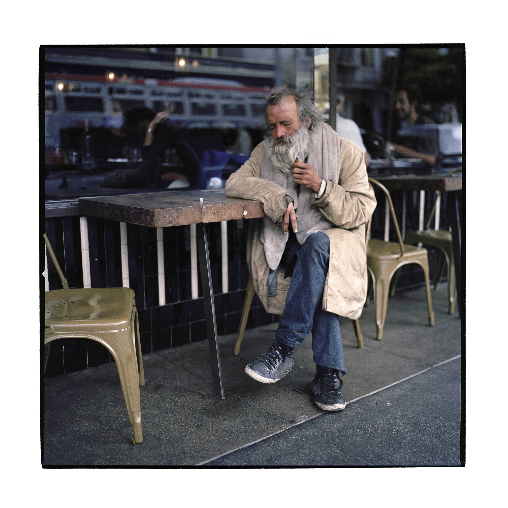 Man, sitting, old, table. Portrait photograph by Horia Manolache, finalist in the Shoot The Frame Portrait photography award, September 2014