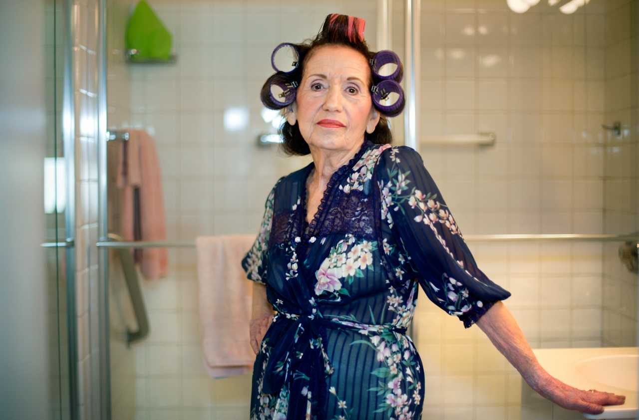 Woman, old, curlers, bathrob. Portrait photograph by Andrea Harnick Tuchman, finalist in the Shoot The Frame Portrait photography award, November 2014