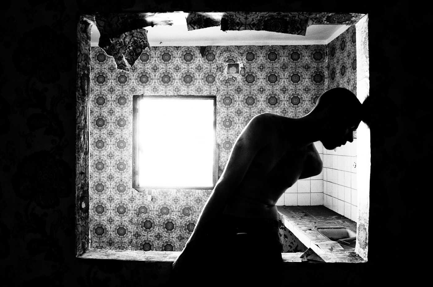Window, tiles, ripped, wall. Portrait photograph by Eli Dijkers, finalist in the Shoot The Frame Portrait photography award, November 2014