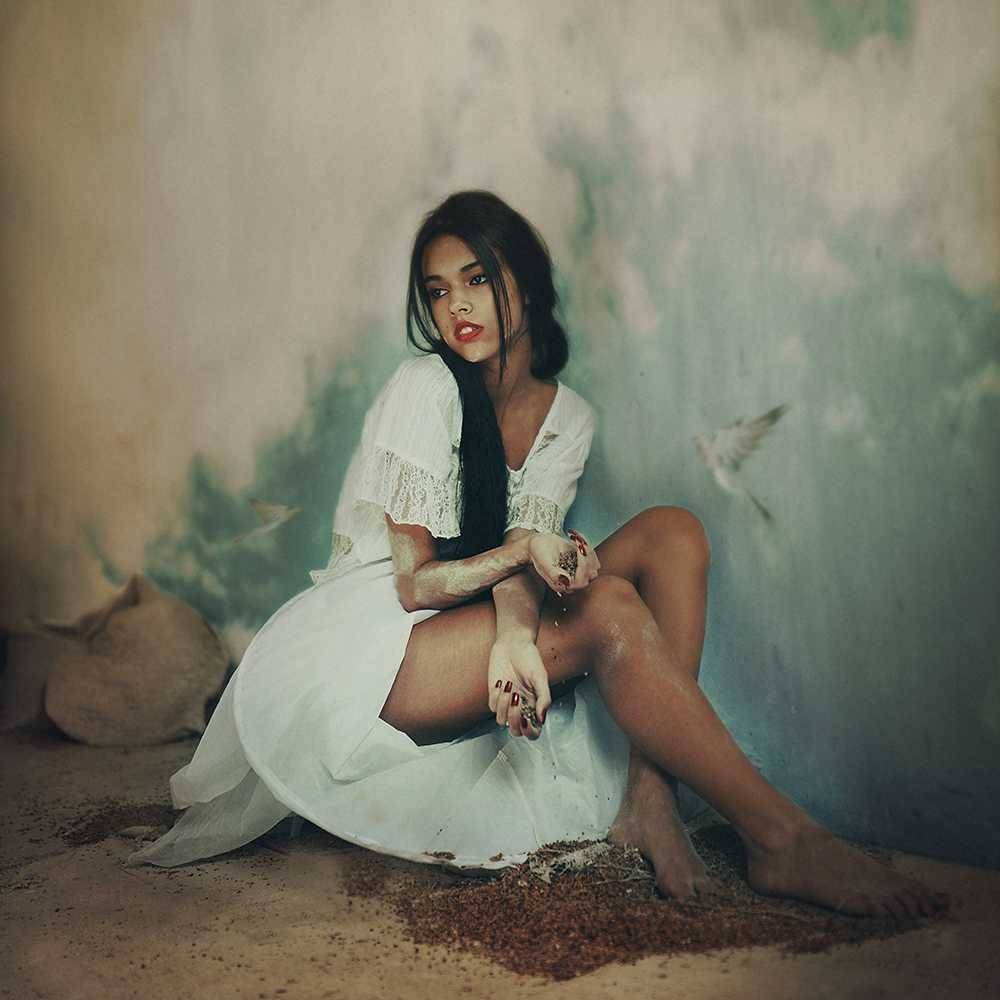 Woman, white, dove, pose. Portrait photograph by Cristina Venedict, finalist in the Shoot The Frame Portrait photography award, December 2014