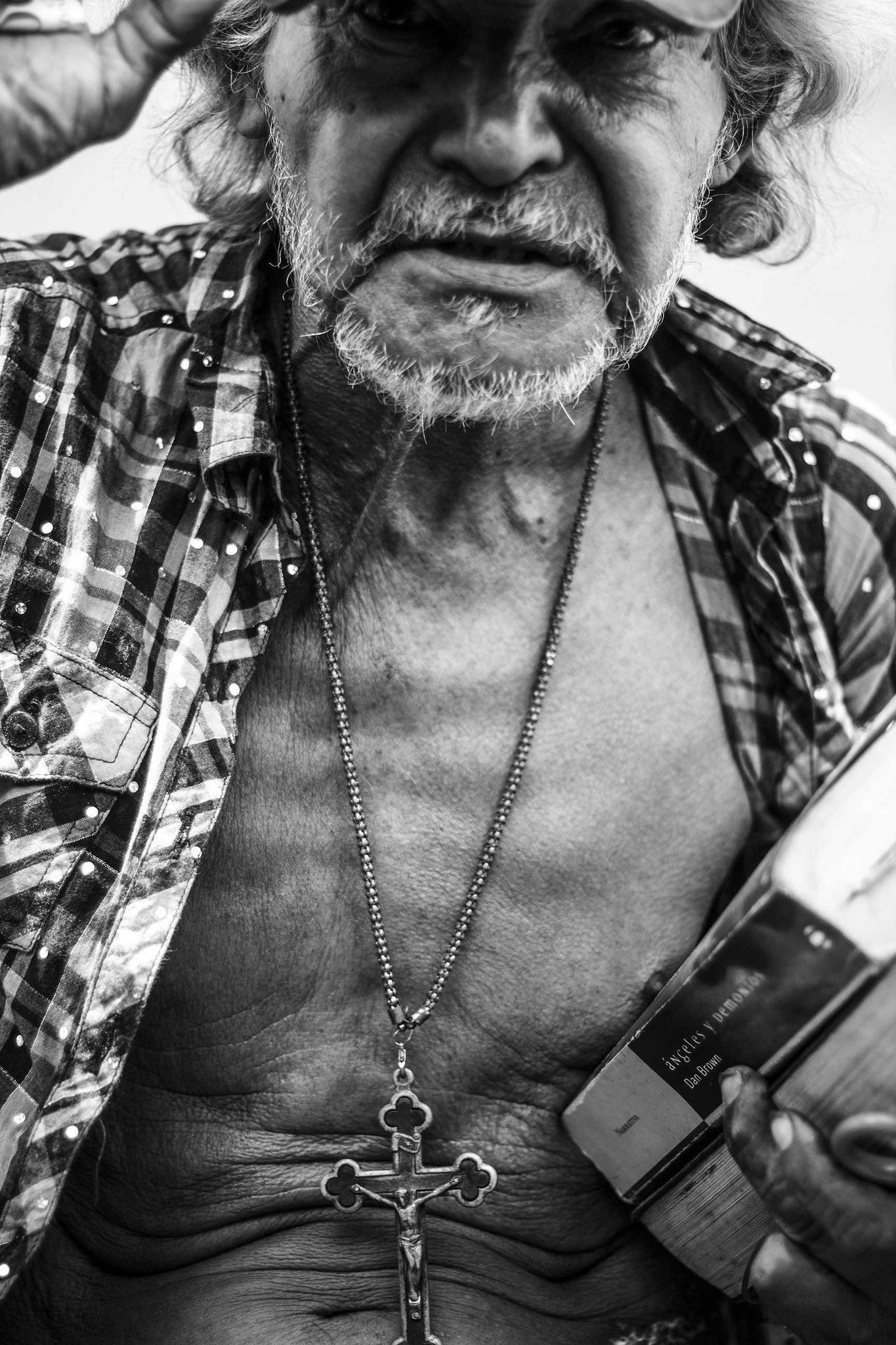 Man, old, beard, crucufix. Portrait photograph by Ernesto Perez, finalist in the Shoot The Frame Portrait photography award, December 2014