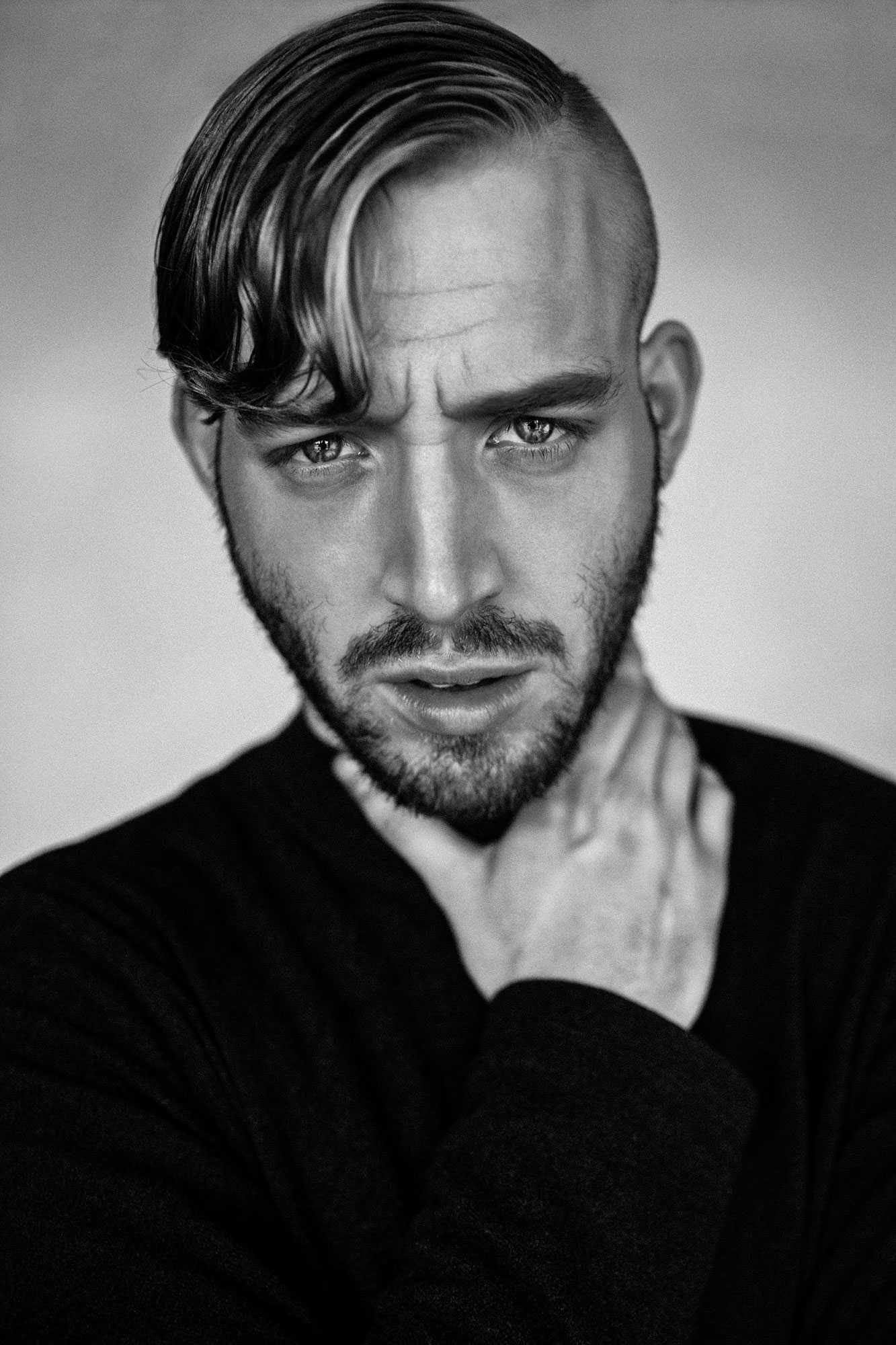 Man, beard, neck, black. Portrait photograph by Honey Fereidoonpour, finalist in the Shoot The Frame Portrait photography award, December 2014