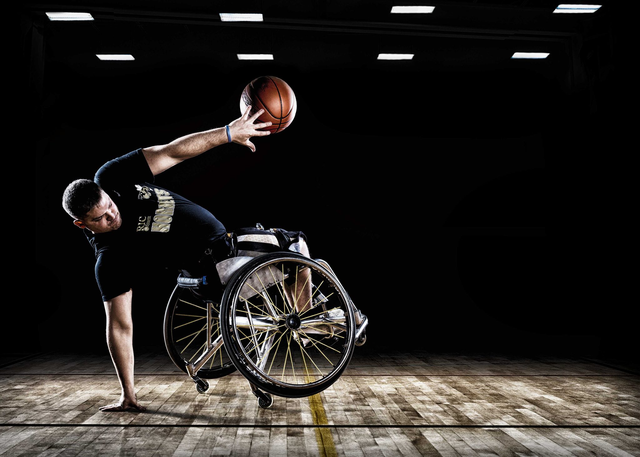 Man, ball, wheelchair. Portrait photograph by Rob Gregory, finalist in the Shoot The Frame Portrait photography award, March 2015