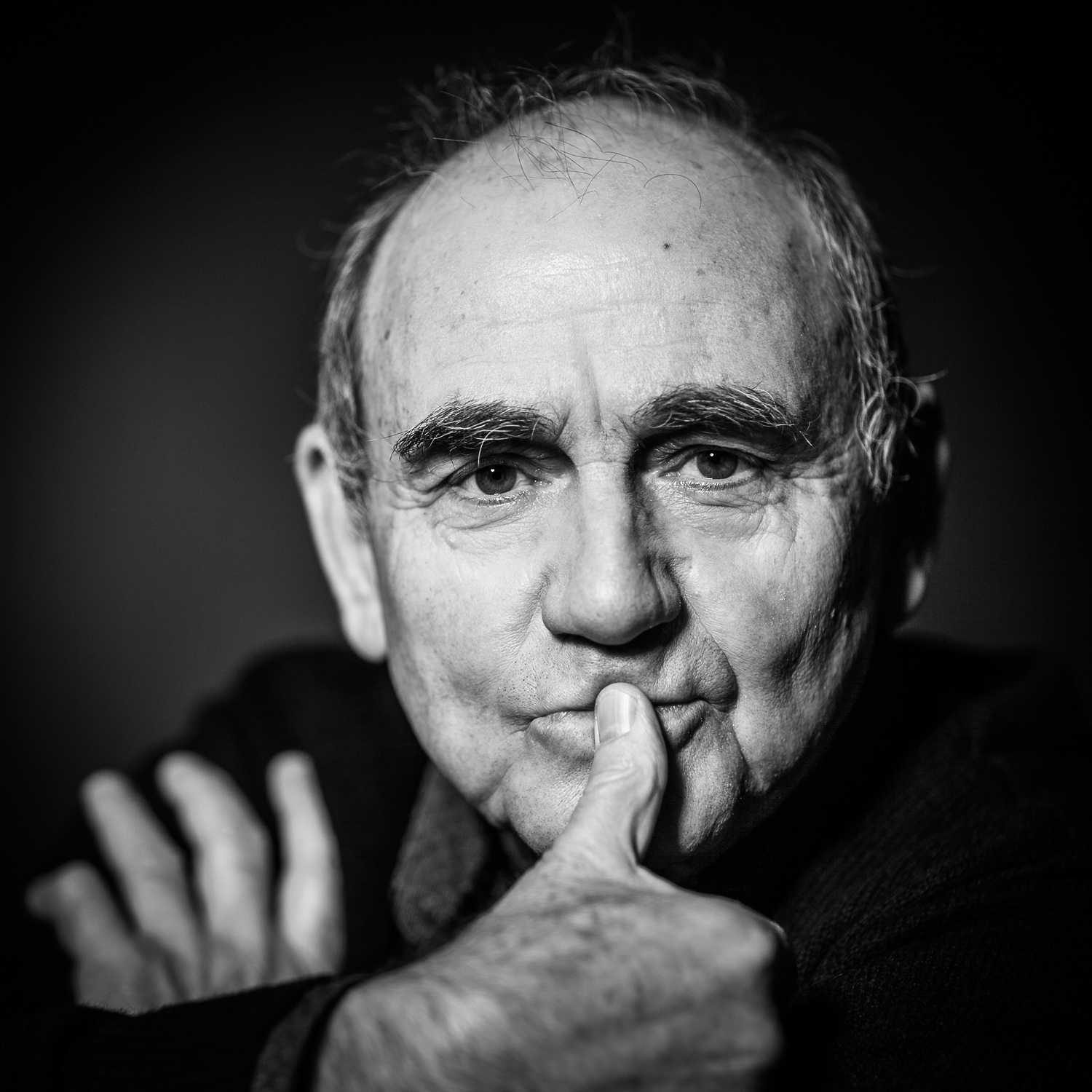 Man, fingers, bald, black. Portrait photograph by Pawel Wodnicki, finalist in the Shoot The Frame Portrait photography award, April 2015