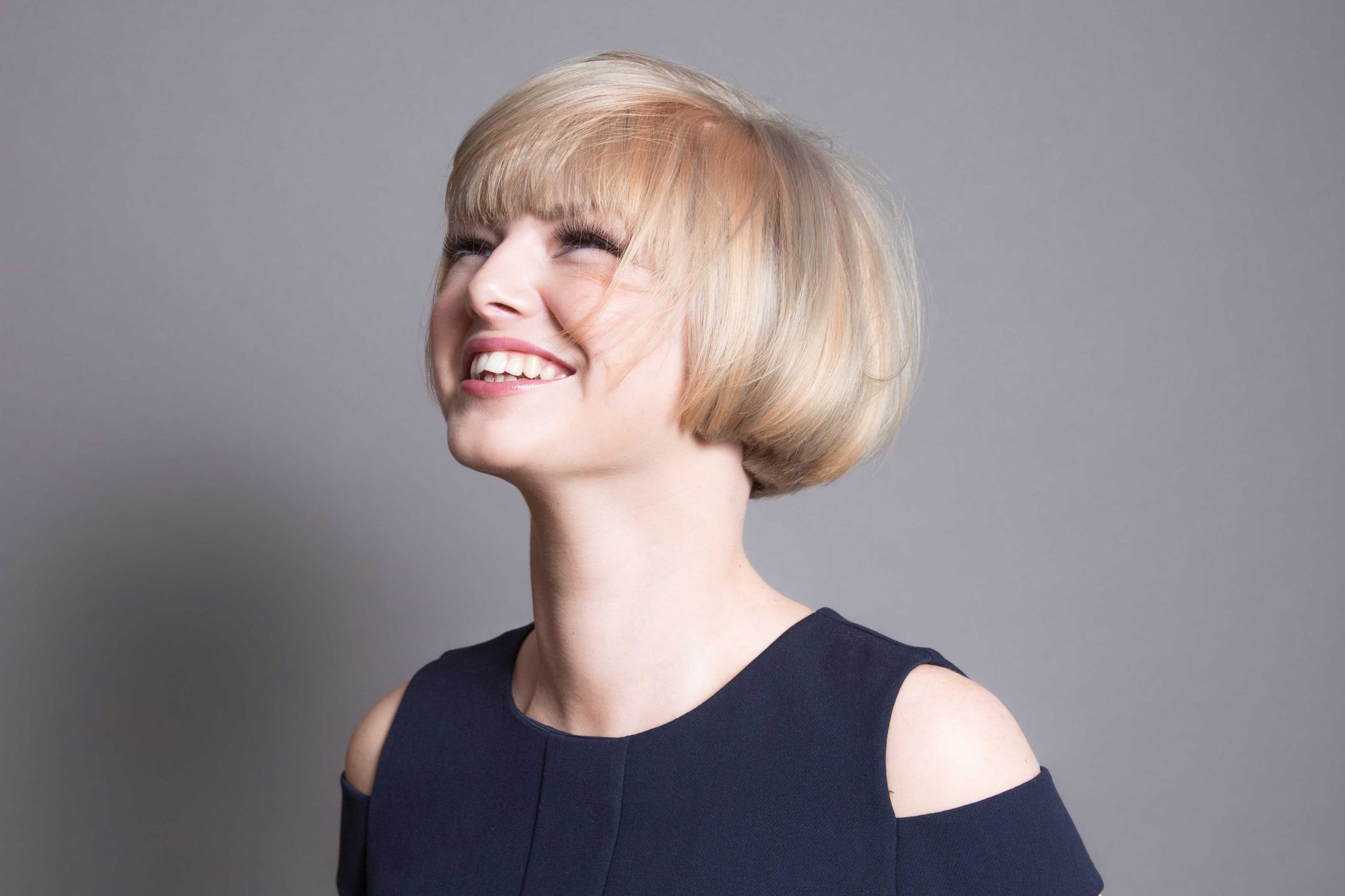 Woman, blond, smiling. Portrait photograph by Gordon MacKenzie, finalist in the Shoot The Frame Portrait photography award, June 2015