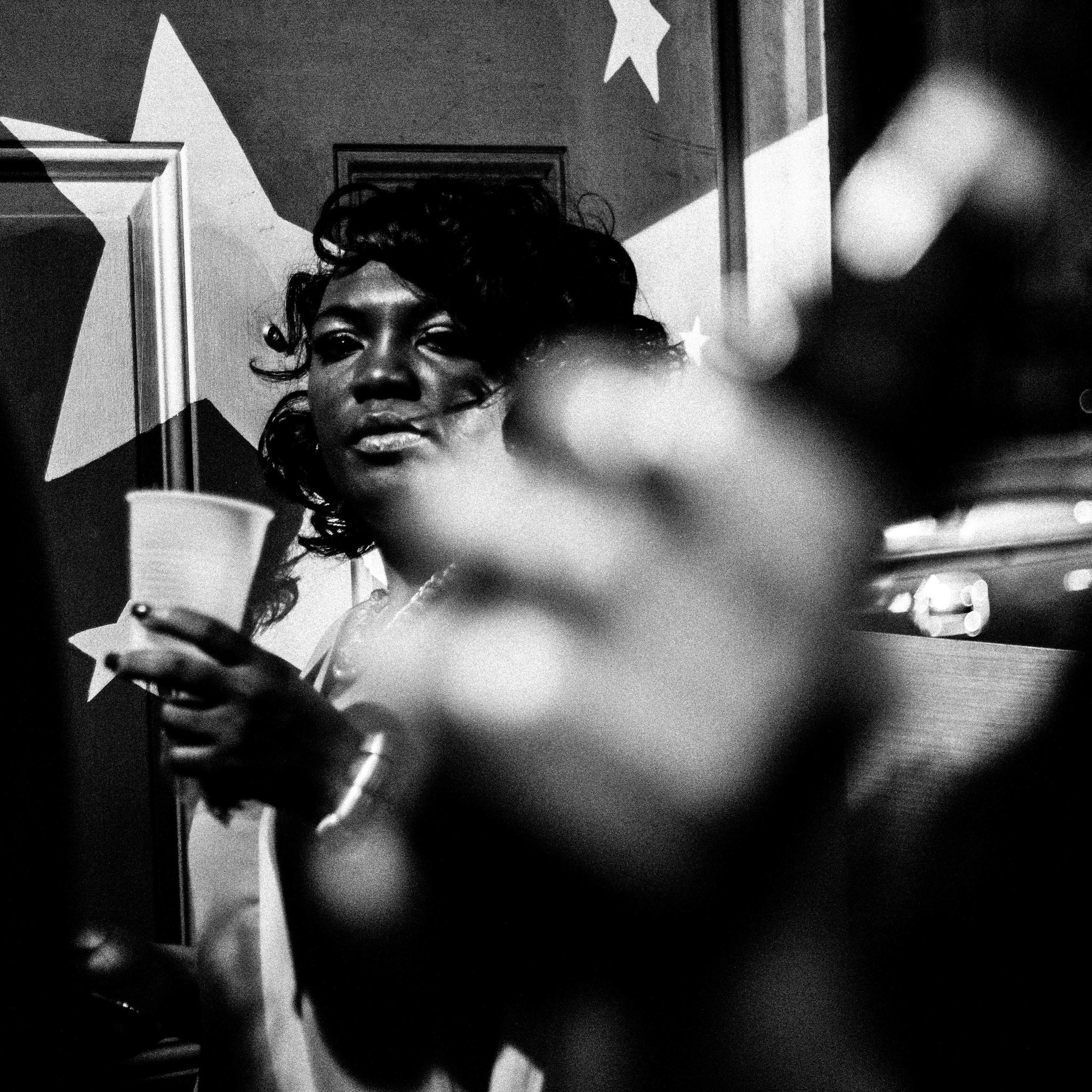 Woman, black, lights, star. Portrait photograph by Marie-Laure Louis, finalist in the Shoot The Frame Portrait photography award, June 2015