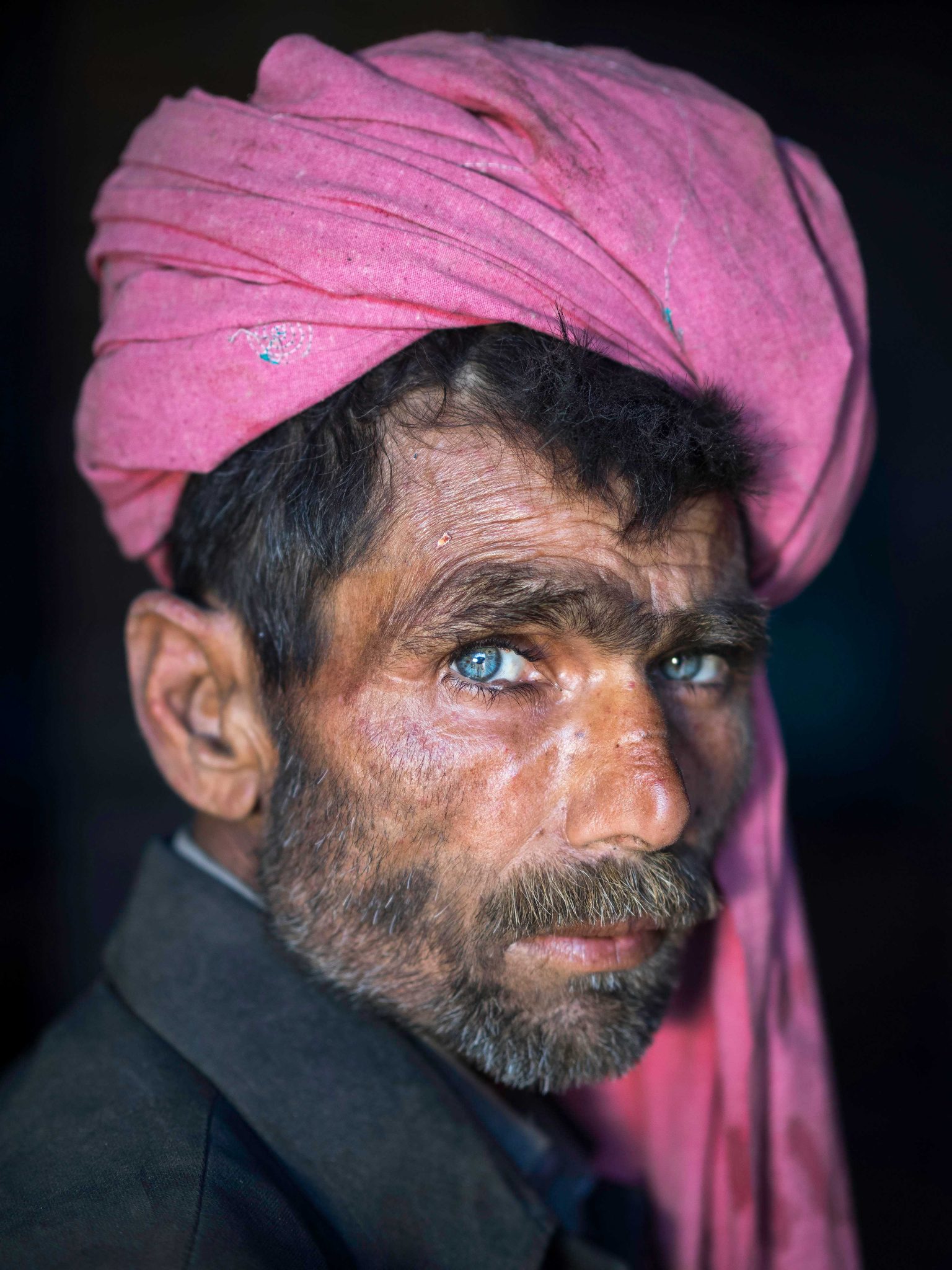 Man, hood, eyes, beard. Portrait photograph by Sohail Karmani, winner of the Shoot The Frame Portrait photography award, July 2015
