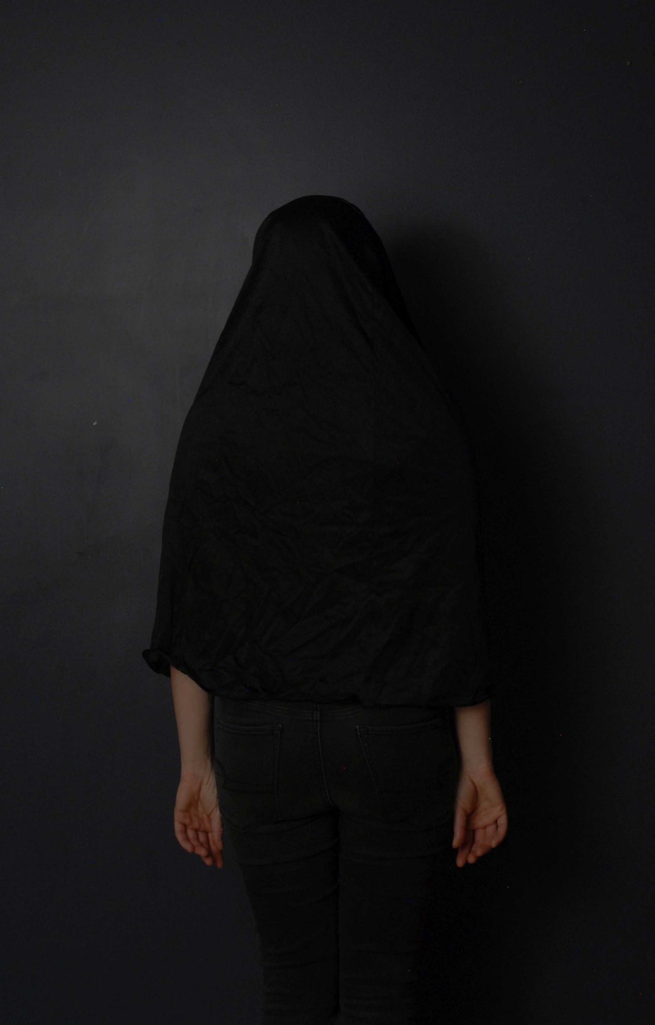 Woman, black, covered. Portrait photograph by Jess Davidson, finalist in the Shoot The Frame Portrait photography award, August 2015