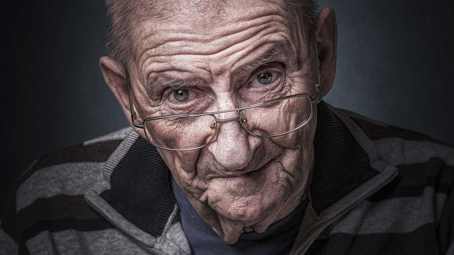 Man, old, glasses, wrinkles. Portrait photograph by Michaela Pucher, finalist in the Shoot The Frame Portrait photography award, October 2015
