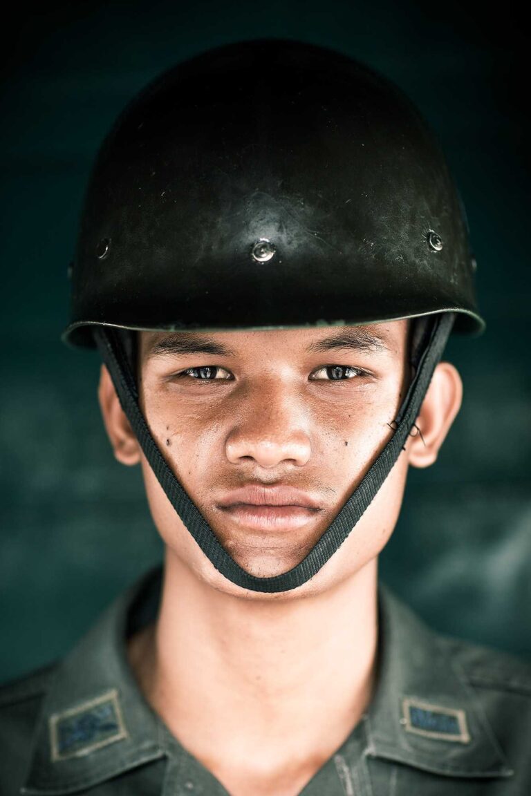 Man, glass, mask. Portrait photograph by Nicolás Biglié, finalist in the Shoot The Frame Portrait photography award, December 2015