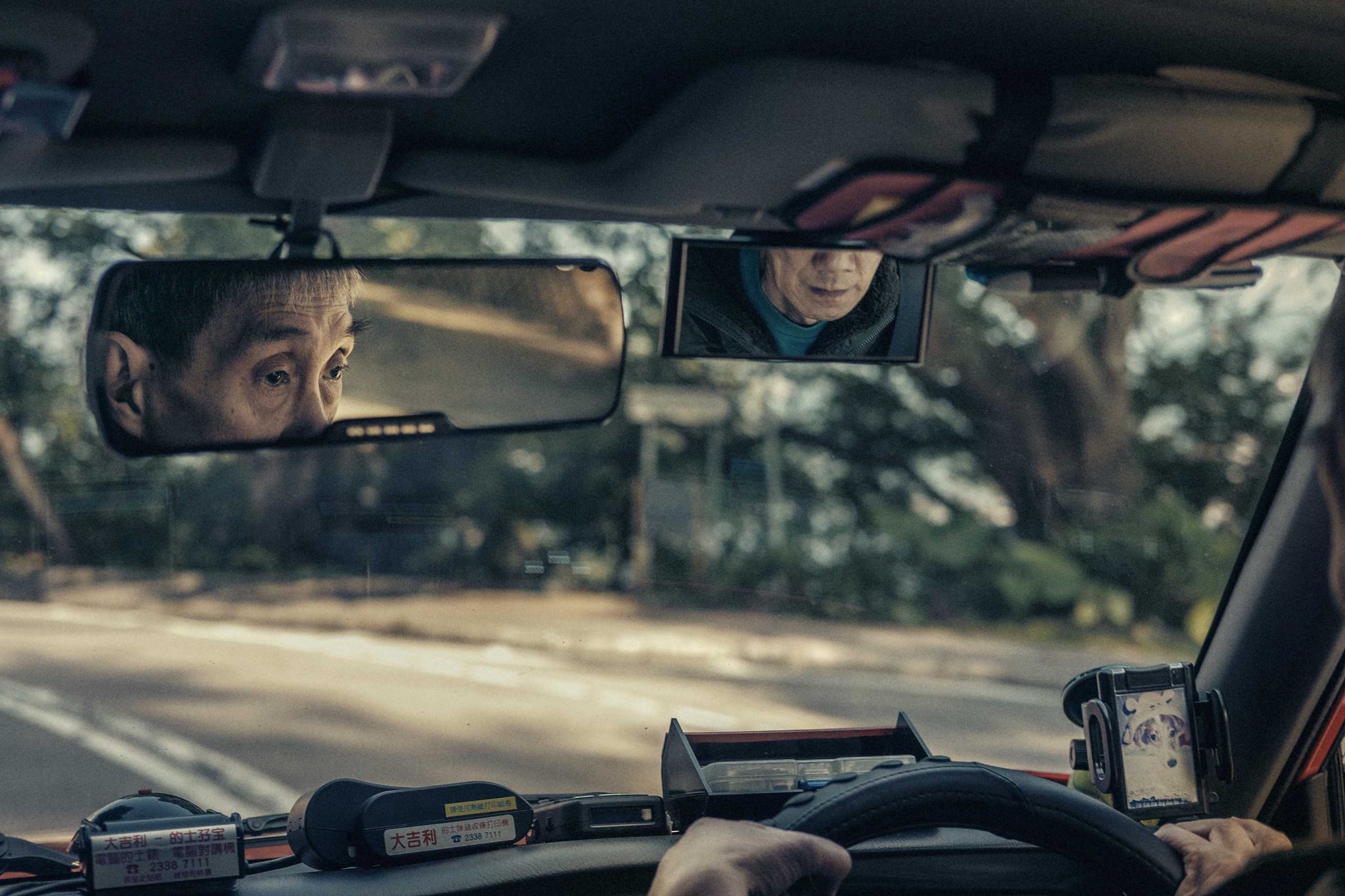 Man, mirror, car. Portrait photograph by Grayson Lauffenburger, finalist in the Shoot The Frame Portrait photography award, March 2016