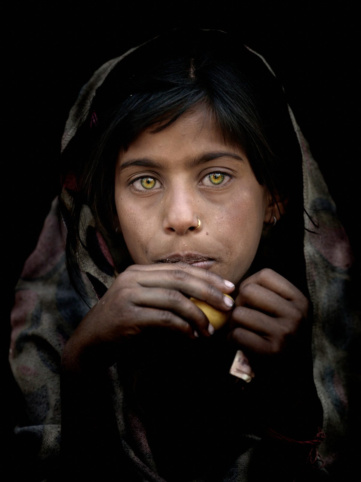 Pierced, nose, hood, eyes. Portrait photograph by Matthieu Rivart, finalist in the Shoot The Frame Portrait photography award, September 2016