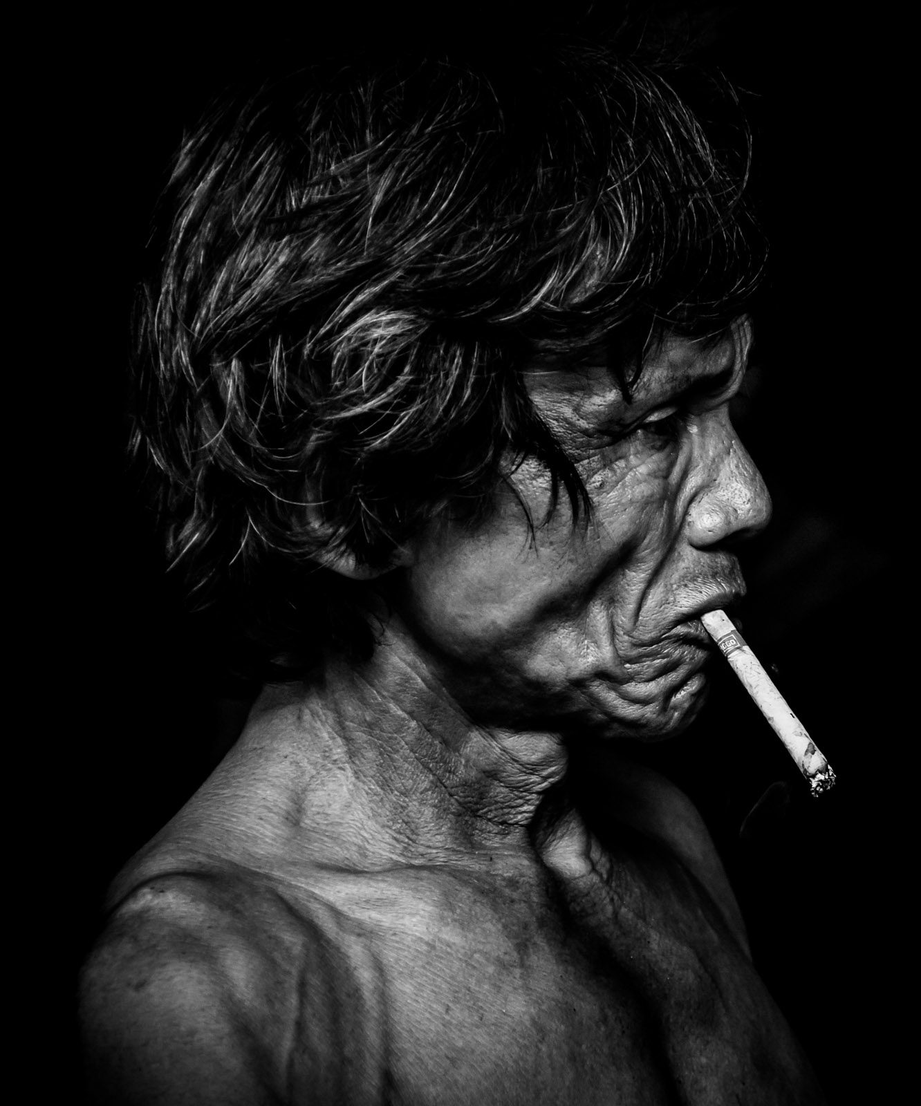Woman, face, focus. Portrait photograph by Jeffrey Mallin, winner of the Shoot The Frame Portrait photography award, September 2016