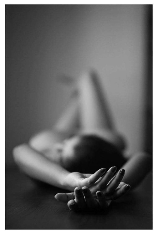 Lying, body, naked, bare. Portrait photograph by Ganesh Devarajan, finalist in the Shoot The Frame Portrait photography award, October 2016