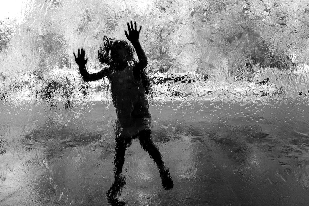 Black, water, drops, human. Portrait photograph by Peter Tsipas, finalist in the Shoot The Frame Portrait photography award, April 2017