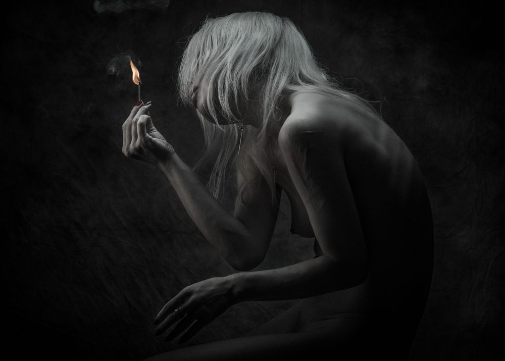 Fire, lady, hair. Portrait photograph by Nobuhiro Ishida, winner of the Shoot The Frame Portrait photography award, January 2018