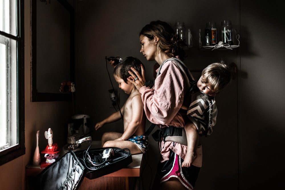 Children, woman, mirror, window. Portrait photograph by Shelby Clowers, finalist in the Shoot The Frame Portrait photography award, June 2018