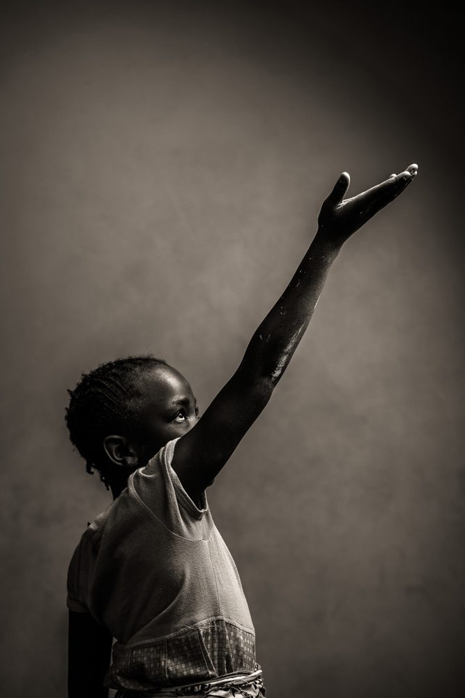 Human, shirt, hands. Portrait photograph by Adrian Kuipers, finalist in the Shoot The Frame Portrait photography award, August 2018