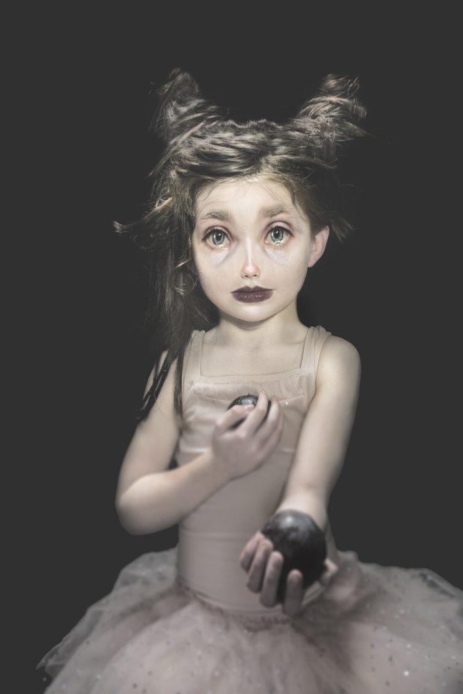 Child, ball, dress. Portrait photograph by Kendall Clark, finalist in the Shoot The Frame Portrait photography award, October 2018