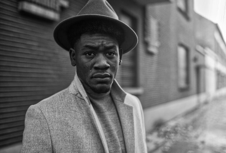 Cap, clothes, house. Portrait photograph by Juan Francisco Hernández, finalist in the Shoot The Frame Portrait photography award, November 2018