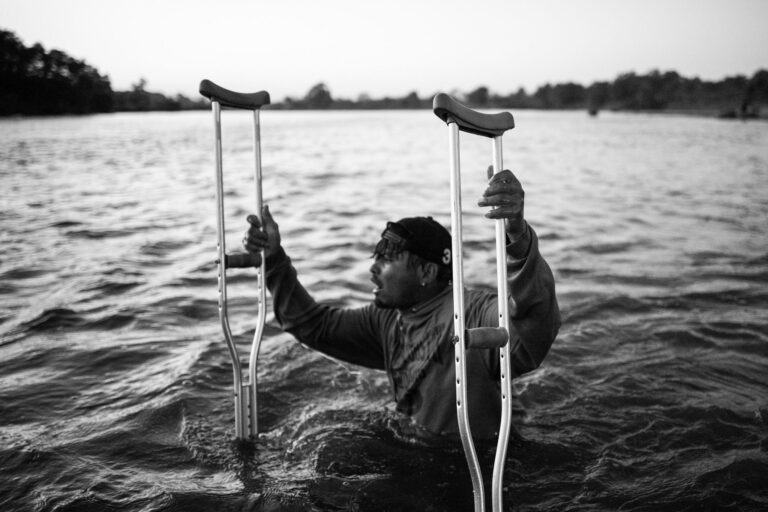 Joel Crosses the Suchiate River, Guatemala. Portrait photograph by Ada Trillo, finalist in the Shoot The Frame Portrait photography award, June 2020