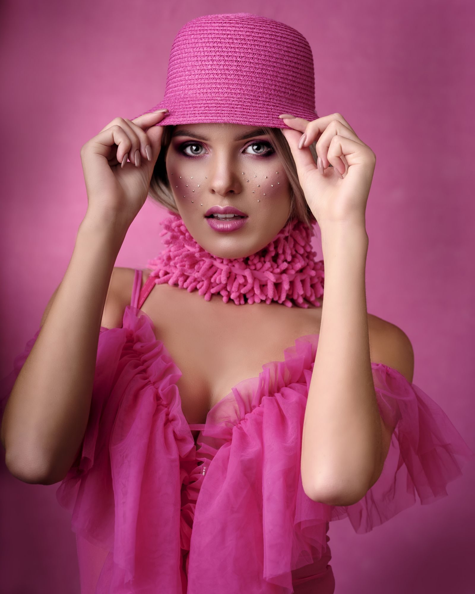 Lady in pink. Portrait photograph by Jacek Kutyba, finalist in the Shoot The Frame Portrait photography award, August 2020