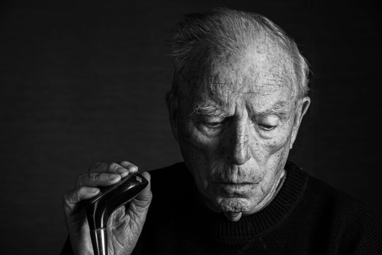 An Old Golfer. Portrait photograph by Mark Aizenberg, finalist in the Shoot The Frame Portrait photography award, November 2020