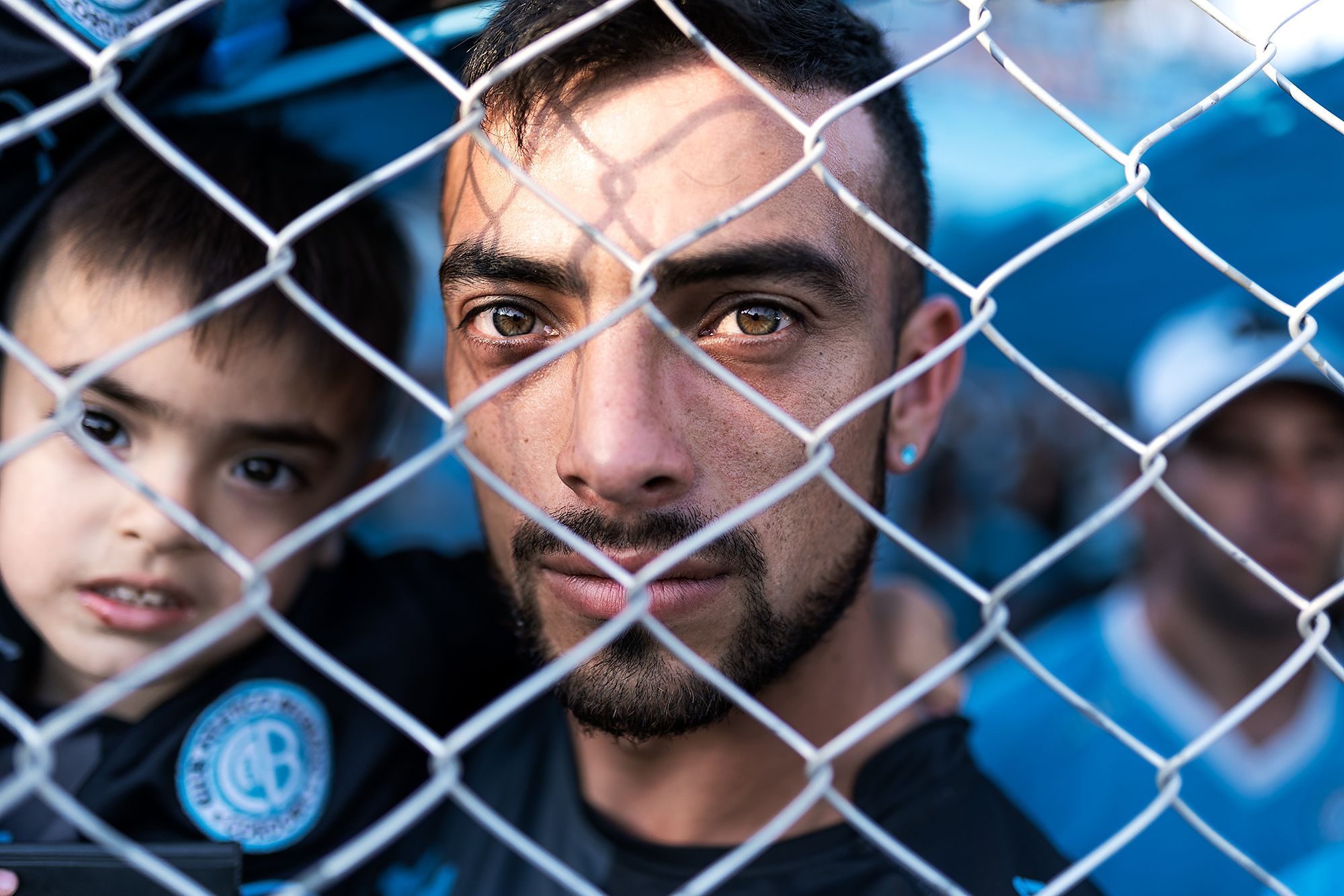 Belgrano Supporter. Portrait photograph by Nicolás Biglié, finalist in the Shoot The Frame Portrait photography award, November 2020