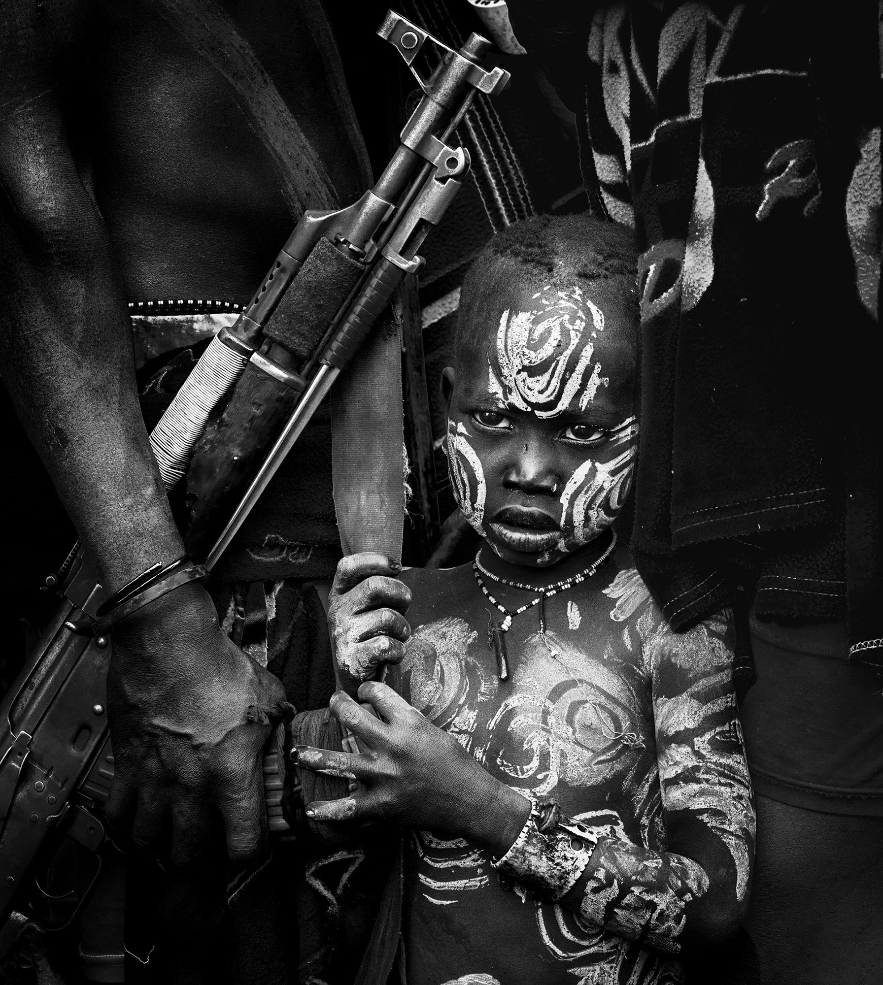 Mursi Boy, Jinka. Portrait photograph by ChanOnn Fong, finalist in the Shoot The Frame Portrait photography award, June 2021
