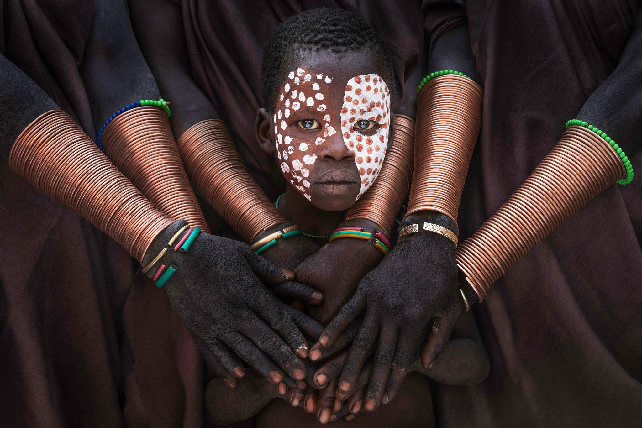 Protection, Omo valley,Ethiopia. Portrait photograph by Sarah Wouters, finalist in the Shoot The Frame Portrait photography award, September 2021