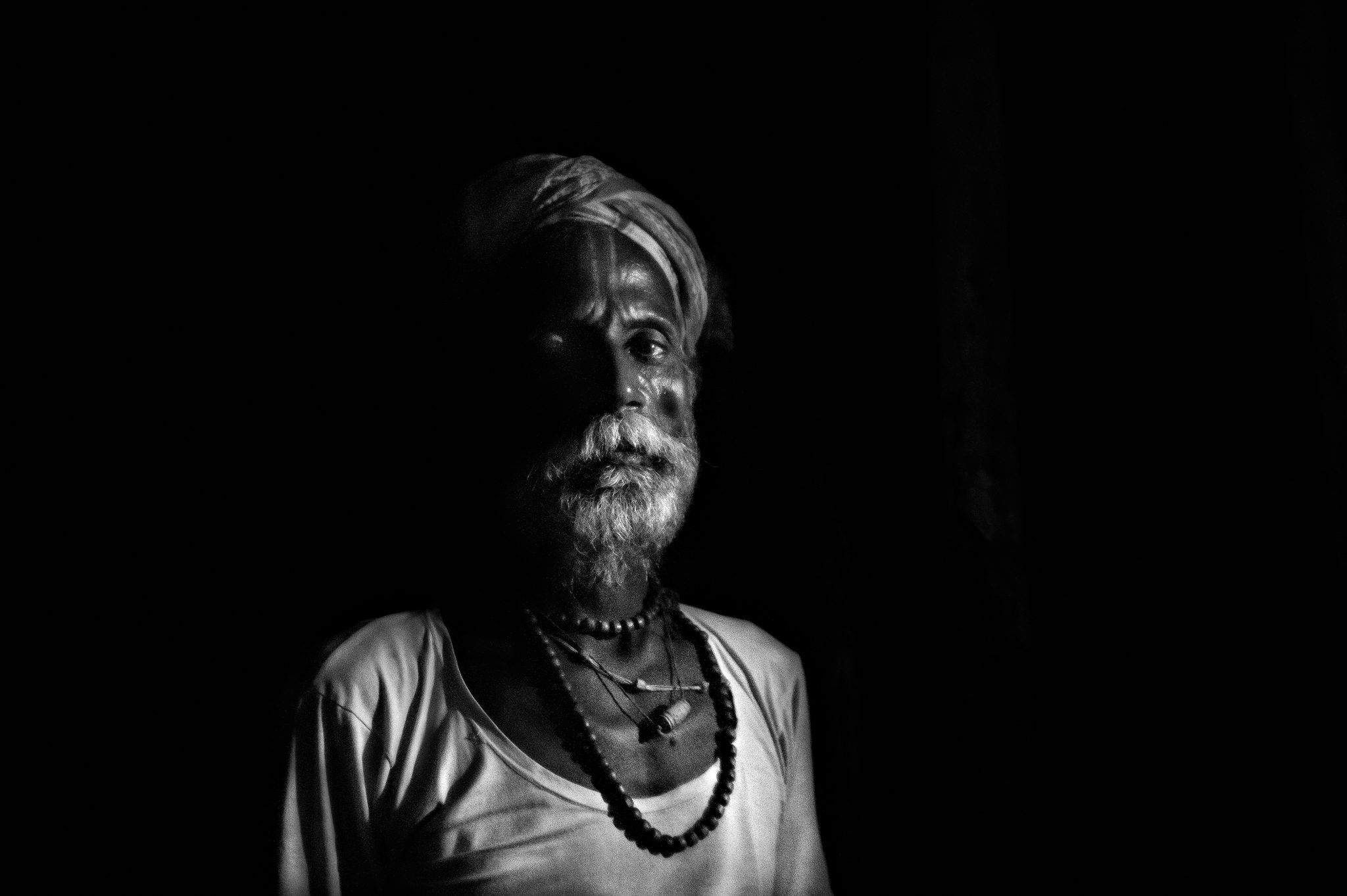 Monochrome, rembrandt, one light. Portrait photograph by Mark Frederick Jereos, finalist in the Shoot The Frame Portrait photography award, January 2023
