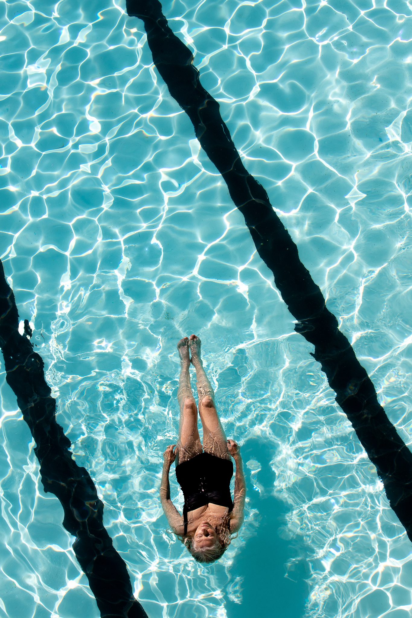 Aqua Planing, Bondi Icebergs Pool. Portrait photograph by Wendy Coombes, finalist in the Shoot The Frame Portrait photography award, March 2023