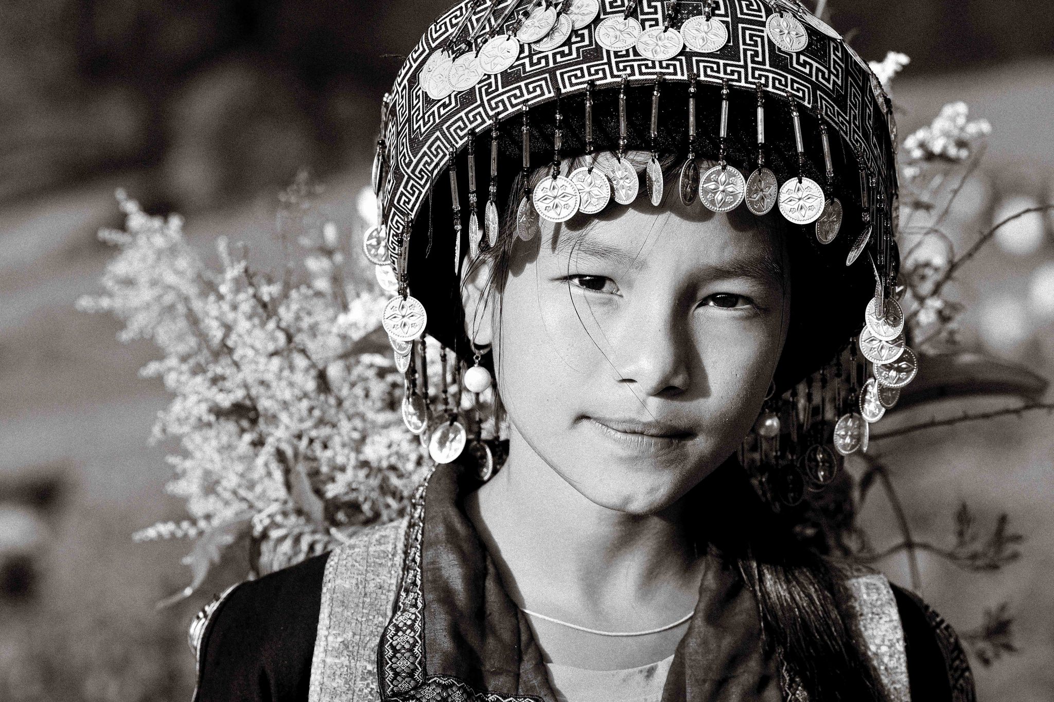 H'mong ethnic girl, Mu cang chai, Yen Bai, Vietnam. Portrait photograph by Chim Oanh, finalist in the Shoot The Frame Portrait photography award, April 2024