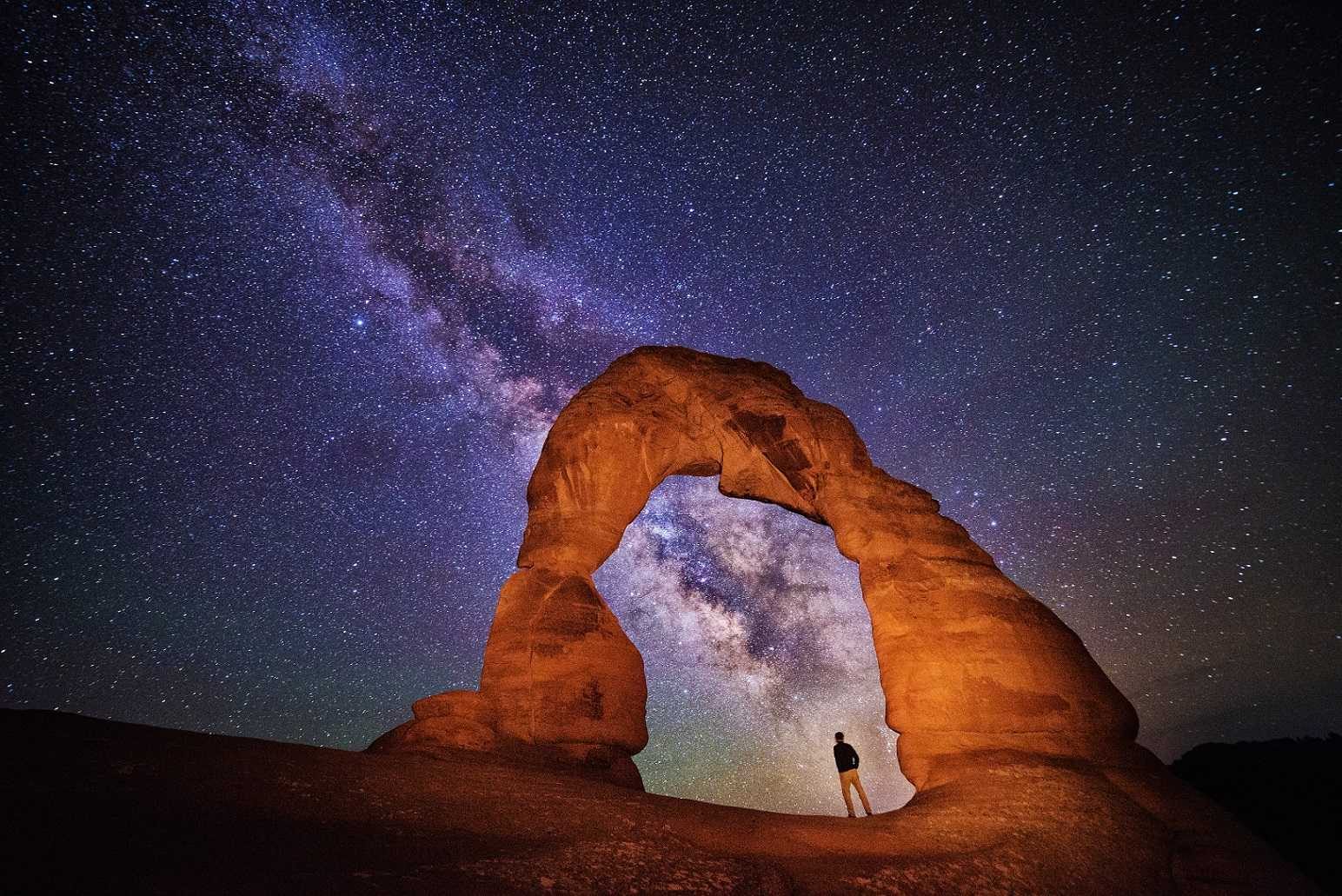 Man, standing, lights. Landscape photograph by Max Seigal, finalist in the Shoot The Frame Landscape photography award, October 2013