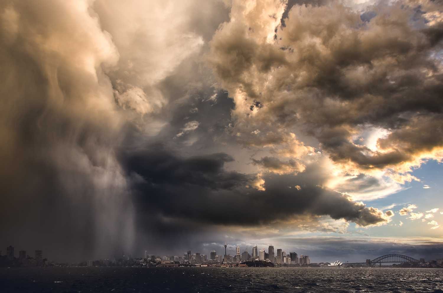 Clouds, buildings, city, ocean. Landscape photograph by Pamela Pauline, finalist in the Shoot The Frame Landscape photography award, April 2015