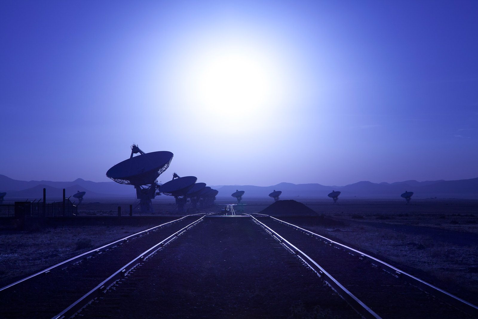 Railings, satellite ground system, hills. Landscape photograph by Lou Fischer, finalist in the Shoot The Frame Landscape photography award, June 2016