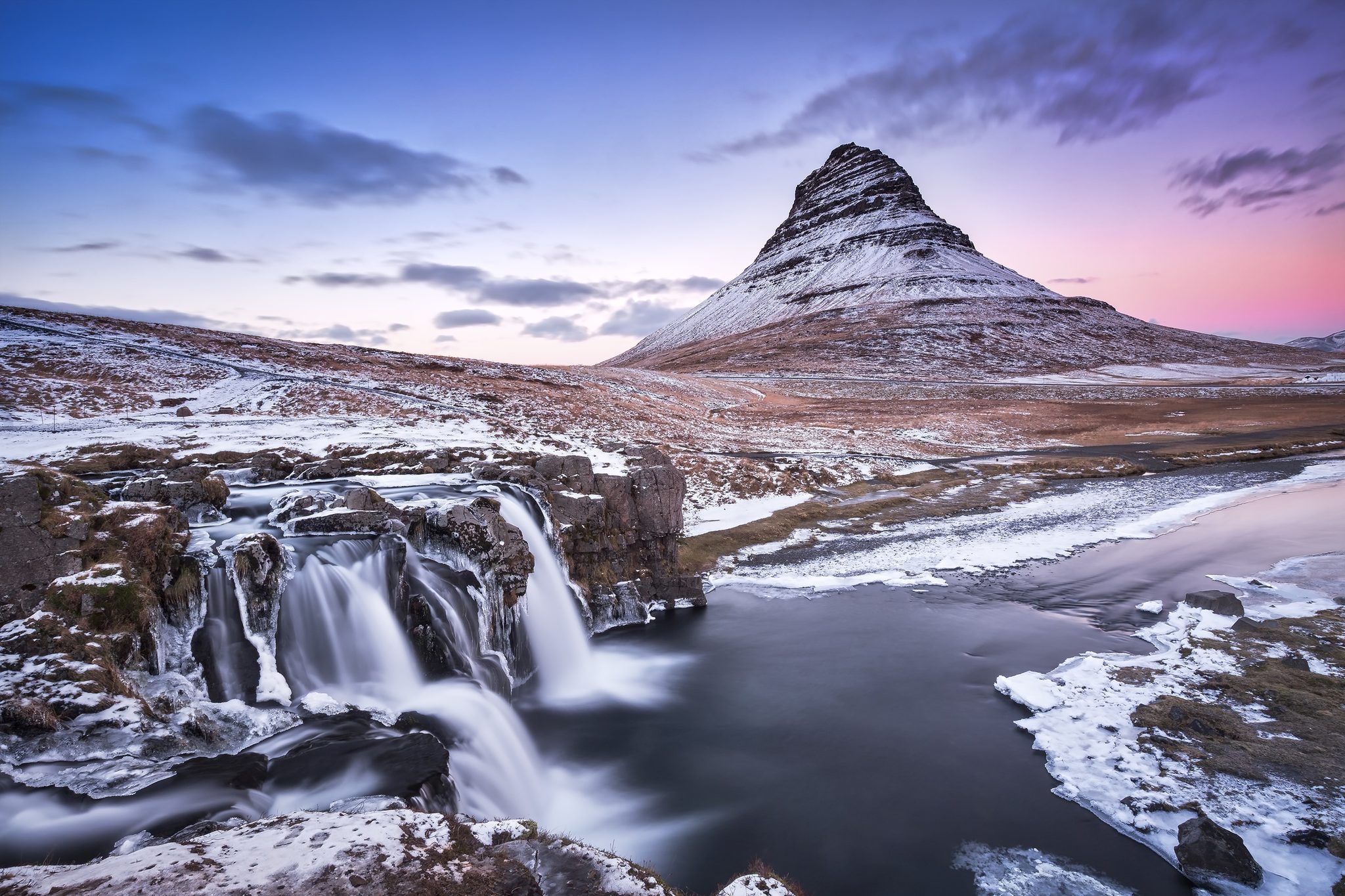 Snowflakes, waterfalls, rocks, flow. Landscape photograph by Rich Wiltshire, winner of the Shoot The Frame Landscape photography award, January 2017