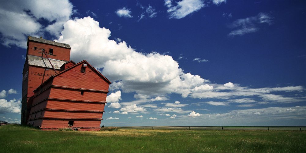 Barn, sky, grass. Landscape photograph by Robert Cassway, finalist in the Shoot The Frame Landscape photography award, November 2017