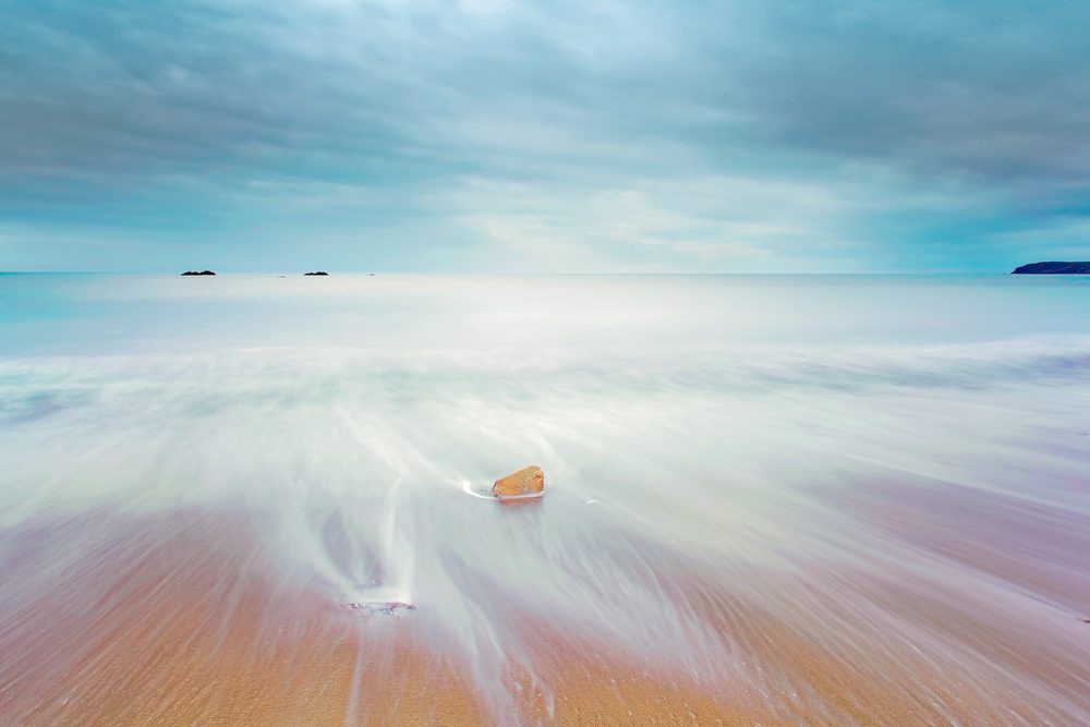 Rock, island, sky, clouds. Landscape photograph by Dick Doyle, finalist in the Shoot The Frame Landscape photography award, January 2018