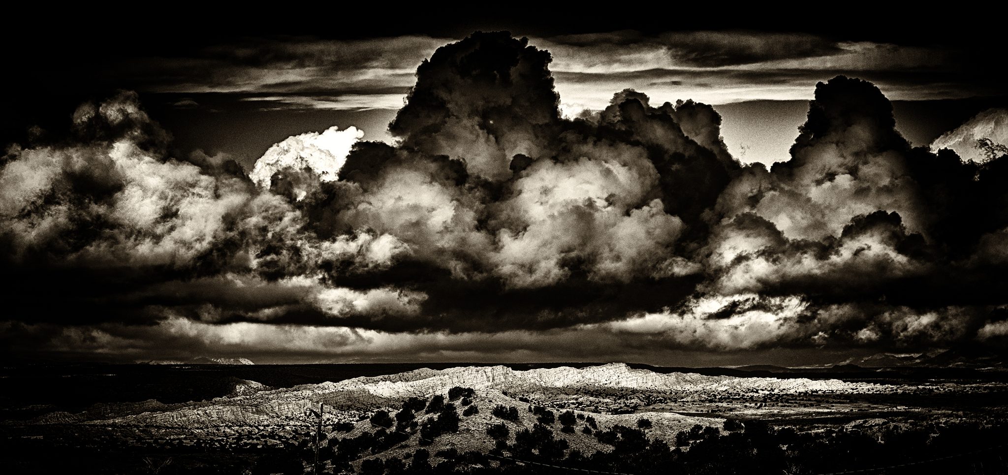 Escarpment above Pojoaque, NM, USA, Pojoaque, NM 87506, USA. Landscape photograph by Carl Moore, finalist in the Shoot The Frame Landscape photography award, January 2021